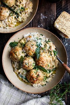 two plates filled with meatballs and rice on top of a table next to bread