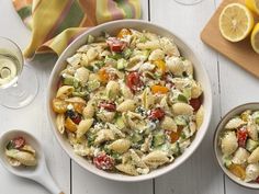 pasta salad with tomatoes, cucumbers and other vegetables