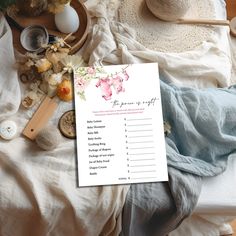 a table with flowers and other items on it