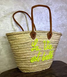 Embark on your sun-soaked adventures with the elegance of our Morocco Basket - your ideal companion for those idyllic beach days and summer outings. This Farmers Market Bag isn't just a statement of style but a trove of practicality for aficionados of the coast and connoisseurs of fashion. Meticulously interwoven from straw, enhanced with fine leather detailing, this Market Basket Bag marries resilience with chic, offering a spacious haven for all your day-out essentials - be it the plush beach towel or the quintessential bottle of sunscreen. Its design echoes the charm of a leisurely stroll by the sea or an amble through vibrant French markets, elevating your presence with its sophisticated, woven allure. Beyond its visual appeal, this Straw Beach Tote stands as a thoughtful token of appr Market Basket Bag, Straw Beach Tote, Moroccan Basket, French Market Bag, French Baskets, Farmers Market Bag, Straw Basket, French Market, Market Baskets