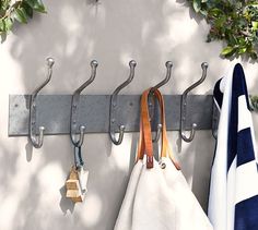 there are three hooks on the coat rack