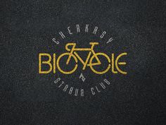 there is a bicycle and star club logo on the black shirt that has yellow lettering