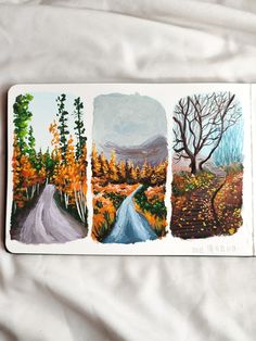 three paintings of trees and a road are shown on a white sheet that is laying on a bed