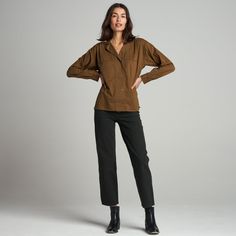 The Fay Utility Camp Shirt is roomy and relaxed but decidedly feminine and sophisticated. Crafted from cotton lawn, a lightweight yet durable fine thread poplin, the Faye has a silky-smooth hand feel. Its unique features include a lay-flat camp collar with an elevated top button and loop closure, wide-set center front placket, and exquisite topstitching details on the sleeve placket and cuff. 100% Cotton Button flap patch pockets at the chest High side-slits at the hem for a fashionable tuck But Versatile Fall Blouse With Roll-up Sleeves, Fall Daywear Blouse With Roll-up Sleeves, Effortless Cotton Blouse For Fall, Effortless Fall Daywear Shirt, Effortless Fall Blouse For Casual Gatherings, Effortless Fall Daywear Blouse, Effortless Blouse For Casual Fall Gatherings, Fall Blouse With Spread Collar And Placket, Fall Blouse With Shirttail Hem And Placket