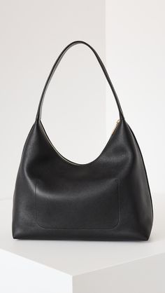 Mansur Gavriel Candy Hobo Bag | Shopbop Timeless Hobo Bag With Gold-tone Hardware, Classic Hobo Bag With Metal Hardware For Formal Occasions, Classic Formal Hobo Bag With Metal Hardware, Classic Work Bags With Metal Hardware, Classic Workwear Bags With Metal Hardware, Classic Office Hobo Bag With Gold-tone Hardware, Classic Hobo Shoulder Bag, Timeless Hobo Bag With Removable Pouch, Classic Business Hobo Satchel Bag