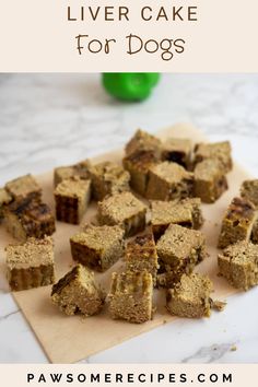 small pieces of cake sitting on top of a cutting board