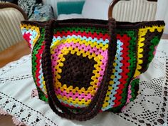 Handmade Crochet Shoulder Bag, Colorful Motifs, Stylish Boho Accessory, Lightweight Everyday Bag, Perfect Gift for Her, Unique Design This colorful crochet granny square bag is a perfect blend of functionality and bohemian charm. Handmade with high-quality cotton yarn, it features vibrant motifs that add a pop of color to your everyday style. The bag is lined with durable suede poplin fabric, ensuring longevity, and includes an inner pocket for added convenience. With XXL dimensions of 24 cm in Handmade Retro Shoulder Bag Gift, Multicolor Crochet Tote Bag As Gift, Multicolor Crochet Tote Bag For Gift, Multicolor Crochet Shoulder Bag Gift, Multicolor Granny Square Crochet Bag Gift, Handmade Multicolor Crochet Bag As Gift, Colorful Handmade Shoulder Bag As Gift, Colorful Handmade Shoulder Bag For Gifts, Handmade Colorful Shoulder Bag Gift