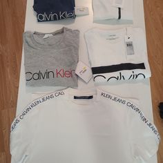 New All With Tags Calvin Klein Shirts Size: All Medium Original Prize $170 Calvin Klein White Logo Print T-shirt, Classic Calvin Klein Crew Neck Top, Sporty Calvin Klein Tops With Logo Print, Calvin Klein White T-shirt For Streetwear, Calvin Klein White Short Sleeve Shirt, Calvin Klein White Short Sleeve Top, White Calvin Klein Casual Shirt, White Short Sleeve Calvin Klein Shirt, Casual White Calvin Klein Shirt