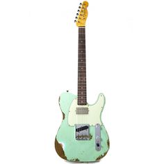 an old green and white guitar is on display in front of a white background,