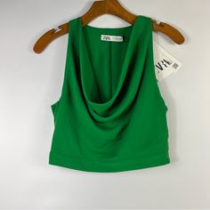 Brand New With Tag. Absolutely Gorgeous Top By Zara! It Features A Pretty Emerald Color, A Flowy Draped Neckline, Cropped Length, Back Hidden Zipper Closure. 100% Polyester. Zara Fitted Green Crop Top, Zara Green Cropped Top, Fitted Green Zara Tops, Zara Ruffle Top, Black Silk Blouse, Denim Corset Top, White Crop Tank, Lace Corset Top, Satin Crop Top