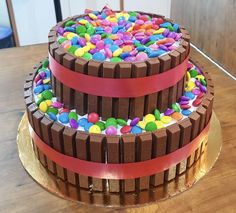 a chocolate cake with candy and candies on top