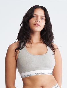 A Calvin Klein icon. An effortless sporty look that feels sexy every day. Made with super soft and supple cotton modal stretch for all-day comfort. Pairs well with Modern Cotton Bikini , Modern Cotton Thong , and Modern Cotton High Waist Bikini .  Material: 53% Cotton, 35% Modal, 12% Elastane. Cotton Bralette, Sporty Look, Bralette, Calvin Klein, High Waisted, Crop Tops, Women's Top