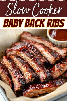 slow cooker baby back ribs with bbq sauce in the background and text overlay that reads slow cooker baby back ribs