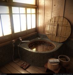 a large stone bathtub sitting in a bathroom next to a window