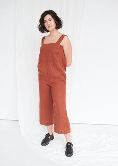 "SIZING & FIT This garment is true to size, and we recommend choosing the size you usually wear. If you want the garment to be loose-fitting, choose a larger size than you usually wear. Before placing an order, check the approximate measurements of the finished garment given below. Model is 5′9″ (175cm) tall with a 97cm/38″ bust, 71cm/28″ waist, 109cm/43″ hip, and she is wearing an L in terracotta. XS Length ± 134cm | 52.7\" Shoulder crotch length ± 76cm | 29.9\" Bust ± 90cm | 35.4\" Hips ± Brown Relaxed Fit Jumpsuit Overall, Brown Relaxed Fit Overall Jumpsuit, Brown Relaxed Fit Jumpsuit, Brown Relaxed Fit Overalls, Terracotta Jumpsuit, Women Linen Clothing, Jumpsuit Linen, Oversized Jumpsuit, Romper Women