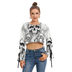 Skull Pile Long Sleeve Cropped Sweatshirt With Lace up White Punk Tops For Fall, Fall Streetwear Top With Skull Print, Long Sleeve Tops With Skull Print, Casual Skull Print Tops For Winter, Casual Winter Tops With Skull Print, Long Sleeve Skull Print Tops For Streetwear, Long Sleeve Tops With Skull Print For Streetwear, Edgy Skull Print Sweatshirt For Fall, Fitted Skull Print Tops For Winter