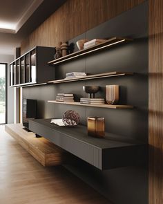 a living room filled with furniture and bookshelves on top of wooden shelves in front of a sliding glass door