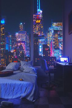 a bedroom with a view of the city at night