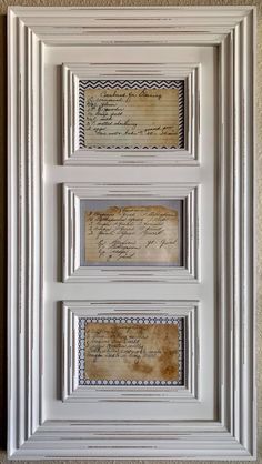 an old white frame with some writing on it