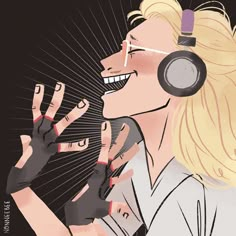 a woman wearing headphones and holding her hand up