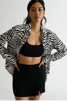 Extra Attention Black & White Zebra Button Down Blouse https://www.tobi.com/product/77997-tobi-extra-attention-zebra-button-down-blouse?color_id=110930&utm_source=pinterest&utm_medium=social&utm_campaign={campaignid}_{adgroupid}_{product_id} Zebra Button Up Outfit, Casual Long Sleeve Tiger Print Tops, Trendy Long Sleeve Tiger Print Tops, Chic Zebra Print Blouse, Trendy Black Zebra Print Tops, Trendy Long Sleeve Tops With Zebra Print, Black Long Sleeve Top With Tiger Print, Black Tiger Print Long Sleeve Tops, Trendy Long Sleeve Zebra Print Tops