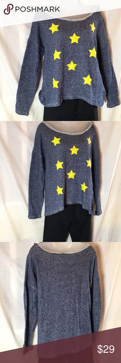 Star embellished high/low sweatshirt Yellow silk stars high light this blue LS sweatshirt with a large round neck! For lounging at home or off to see a movie! Classic Woman Tops Sweatshirts & Hoodies Trendy Blue Star Print Top, Trendy Blue Top With Star Print, Oversized Long Sleeve Tops With Star Print, Long Sleeve Cotton Top With Star Patch, Casual Long Sleeve Star Print Tops, Long Sleeve Cotton Tops With Star Patch, Cotton Long Sleeve Tops With Star Patch, Fall Loungewear Tops With Star Print, Casual Star Print Tops For Loungewear