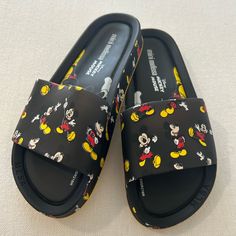 New In Box Playful Black Non-slip Sandals, Playful Black Sandals For The Beach, Playful Non-slip Black Sandals, Fun Black Sandals With Round Toe, Black Round Toe Sandals With Fun Style, Fun Black Synthetic Sandals, Bow Flip Flops, Purple Sandals, Rainbow Sandals