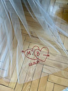 the wedding dress is drawn on the floor