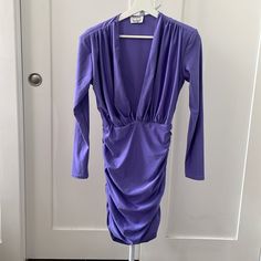 Never Worn Dress Bought In 2019 From Runaway The Label. Mini Length, Long Sleeves, Ruching Throughout The Dress, A Deep V-Neckline And A Double Layer On The Bust. There Is No Zipper But It Is Stretchy Enough To Slip On. 83% Polyester, 17% Spandex V-neck Ruched Mini Dress For Brunch, Purple Ruched V-neck Dress, Stretch V-neck Dress For Brunch, Purple Fitted V-neck Midi Dress, Purple Surplice Neckline Dress For Spring, Purple V-neck Mini Dress For Spring, Runaway The Label, Red Plaid Dress, Bow Detail Dress