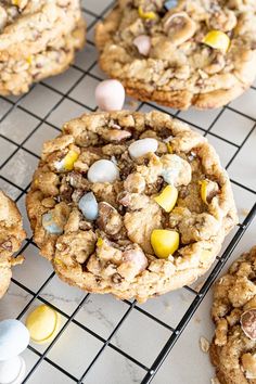 several cookies on a cooling rack with easter eggs