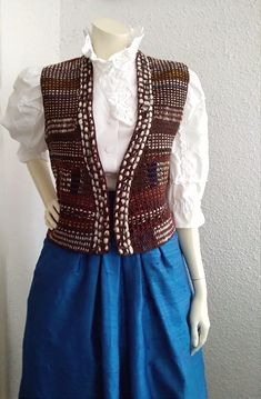 70s crochet woven vest, retro knitted vest, brown multicolor woven vest, no buttons bohemian vest, spring preppy vest, unique vest, color block chunky vest, handmade vest. The vest is in good vintage condition but is not dry clean. Measurements laying flat : shoulders :39 cm (15,5 inches) armpit to armpit: 43 cm (17inches) total lenght:48cm (19 inches) Fitted Retro Brown Sweater Vest, Retro Fitted Brown Sweater Vest, Brown Knitted Sleeveless Vest, Fall Crochet Sleeveless Sweater Vest, Crochet Sleeveless Sweater Vest For Fall, Fitted Brown Bohemian Vest, Vintage Crochet Sleeveless Vest, Multicolor Bohemian Sleeveless Sweater Vest, Chunky Vest