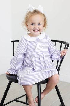 The Purple Stripe Riley Dress is a delightful choice for playtime during cooler weather! Designed with comfort in mind, this long sleeve knit dress is not only perfect for school and playtime but also transitions seamlessly for various occasions. Purple and white soft knit stripes and a white Peter Pan collar with purple picot trim. Elevate its charm by adding a monogram, making it uniquely adorable. Playful Long Sleeve Dresses For Sleepover, Playful Long Sleeve Dress For Playdate, Playful Long Sleeve Playwear Dresses, Spring Long Sleeve Dresses For Playtime, Playful Long Sleeve Dresses For Playwear, Long Sleeve Dresses For Playtime In Spring, Long Sleeve Dresses For Spring Playtime, White Long Sleeve Dress For Sleepover, Playful Long Sleeve Dresses For Fall