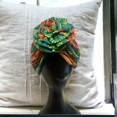 Our head wraps exude timeless sophistication, featuring intricate patterns and vibrant colors inspired by the rich tapestry of African landscapes and traditions. Whether you're stepping out for a special occasion or adding flair to your everyday ensemble, our turban-style wraps are sure to turn heads and spark conversation. Head Scarves, African Head Wraps, African Heritage, African Textiles, Turban Headwrap, Cultural Celebration, Turban Style, Handmade African, African Print Dress