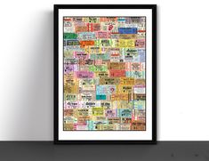 a framed poster with many different types of tickets on it, hanging on a wall