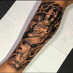 a man's arm with a cartoon character on it