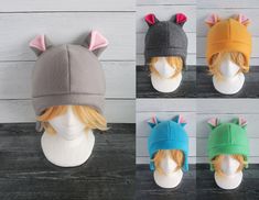 four different styles of hats on mannequins with cat ears and tail tails