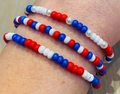 The Beadbound Jewellery💜 patriotic bracelet set is a fun piece of beaded jewellery for a red, white and blue celebration 🇬🇧 🇺🇸 🇦🇺 . Made by hand, the set includes a combination of 3 bracelets made from red, white and blue seed beads.  The beads are threaded on to elastic string so the bracelets will stretch to fit your wrist, but while care is taken to secure the beads, please don't overstretch them to avoid damage. Please choose your bracelet size when ordering. Due to the bracelet being made with small beads it is not recommended for children younger than 3 years. I provide FREE UK 2nd class  delivery (estimated delivery 2-4 days from posting). Tracked international shipping is also available via Royal Mail. All orders come in an organza pouch. Thank you for looking at Beadbound J Patriotic Colorful Beads Bracelet For Gift, Patriotic Beaded Bracelets With Colorful Beads As Gift, Red Beaded Bracelets For 4th Of July, Red Round Beads Bracelets For 4th Of July, Patriotic Red Beaded Bracelets As Gift, Patriotic Red Beaded Bracelets, Patriotic White Friendship Bracelets As Gift, Patriotic White Jewelry With Colorful Beads, Patriotic White Friendship Bracelets Gift