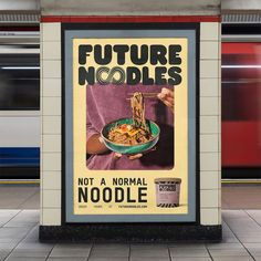 a poster on the side of a train station advertising noodle noodles, which is being served in a bowl