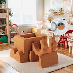 a child's play room with toys and furniture