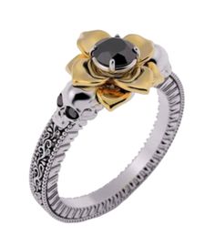 This is the perfect gift for a deep woman with a lotus soul, the flower is so proud and the skulls are holding her like pillars. unique and designed for you or you're beloved. The lotus flower is known as a sacred flower, so if you are Buddhists or Hindus or just a fan of botanic, then this black diamond lotus ring is a must for you. As you may have noticed it is made out of three different colors, the shrank and the prongs are painted in silver, to highlight the engravings and details they have Sacred Flower, Disney Engagement Rings, Lotus 7, Disney Engagement, Lotus Ring, Black Lotus, Skull Rings, Skeleton Head, Black Gems