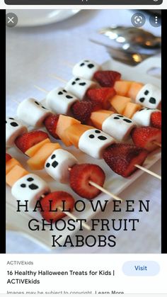 halloween fruit kabobs with ghost faces and strawberries on skewers for sale