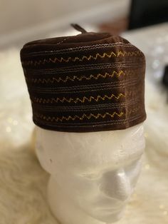 Hand made Yoruba Traditional hat Brown Short Brim Hat As A Gift, Traditional Brown Hat With Short Brim, Adjustable Brown Hat For Church, Brown Adjustable Hat For Church, Brown Short Brim Hat For Wedding, Brown Short Brim Wedding Hat, Traditional Church Hat, Traditional Handmade Wedding Hats, Adjustable Brown Mini Hat As Gift