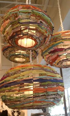 the light fixture is made out of strips of fabric