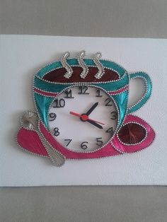 a clock made to look like a coffee cup