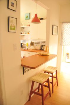 the kitchen is clean and ready to be used as a dining room or living room