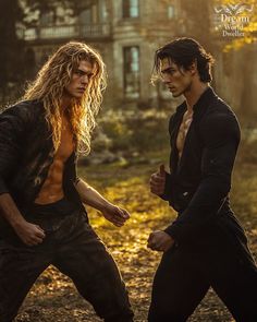 two men standing next to each other in front of a house with long hair and no shirt on