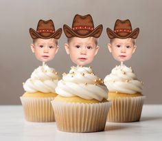 three cupcakes with little boys wearing cowboy hats