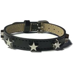 "Love stars?   You'll love this bracelet!  It has Chrome color star studs evenly spaced across the center of a genuine black leather buckle bracelet wristband strap. This black leather buckle wristband bracelet strap is 10mm wide and about 8 inches long.   It can fit a wrist from 5.5\"  to 7.5\" around.  The strap is made of Genuine leather material and are stamped as such on the back. They are sewn around the edges for more durability. The band is adjustable and has a nickel tone buckle closure Black Trendy Bracelets With Studs, Trendy Black Bracelets With Studs, Adjustable Black Studs Jewelry, Edgy Adjustable Star-shaped Jewelry, Adjustable Edgy Star Jewelry, Adjustable Edgy Star-shaped Jewelry, Adjustable Star-shaped Edgy Jewelry, Adjustable Black Bracelet With Star Charm, Trendy Silver Leather Bracelet With Studs