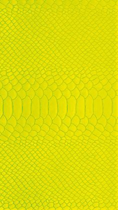 a yellow snake skin textured background that looks like it could be used as a wallpaper