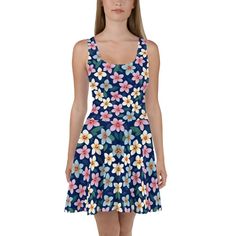 Dress to impress with this sleeveless skater dress! The soft fabric and flared skirt give it an elegant twist that brings out the intricate design with a beautiful vibrancy. * 82% polyester, 18% spandex * Fabric weight: 6.78 oz/yd² (230 g/m weight may vary by 5% * Smooth and elastic fabric * Mid-thigh length flared skirt * Elastic waistline * Overlock seams, coverstitch hemline * Blank product components sourced from China Fitted A-line Sleeveless Dress For Beach, Flowy A-line Summer Mini Dress, Flowy A-line Mini Dress With Floral Print, Flowy A-line Sleeveless Dress For Beach, Flowy A-line Summer Sundress, Chic Floral Print Dress With Flared Skirt, Summer Floral A-line Party Dress, Fitted Floral Print Sleeveless Dress For Vacation, Fitted A-line Sleeveless Dress For Vacation